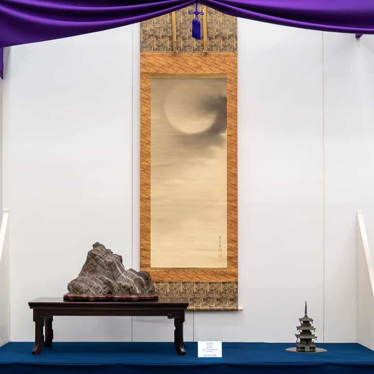 Stone display with scroll
